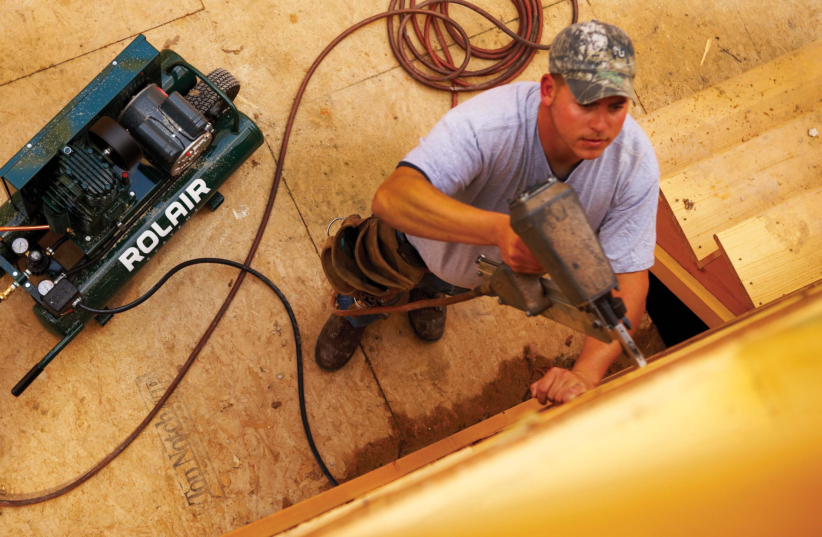 Man with Nail Gun